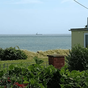 Dawn | Historic Coastguard Cottage with Sea Views | Secure Garden